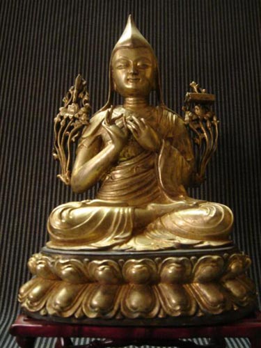 Antique gilt bronze Tibetan Buddha 