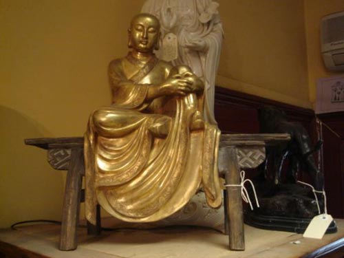 Gilt bronze statue of a buddhist scholar 