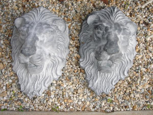 Pair Lion mask Heads lead finish